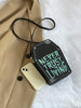Never Trust the Living Crossbody Bag