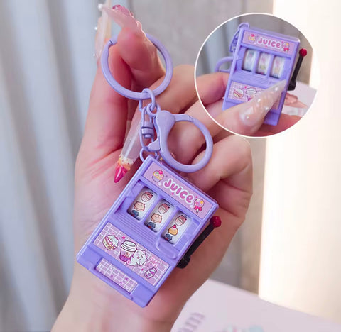 Purple slot machine keychain